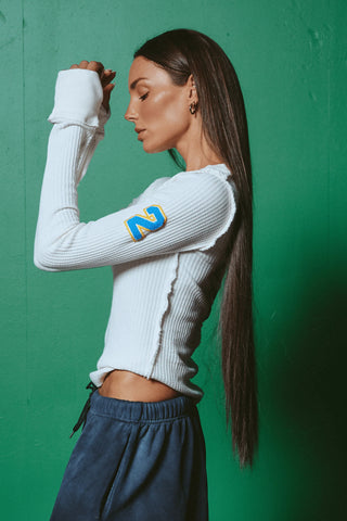 COMING SUNDAY 9PM - The Ten On Repeat Top - Off White